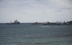 Construction vessels float on Oura Bay at the site of a future U.S. Marine Corps airfield at Camp Schwab, Okinawa, Jan. 23, 2025.