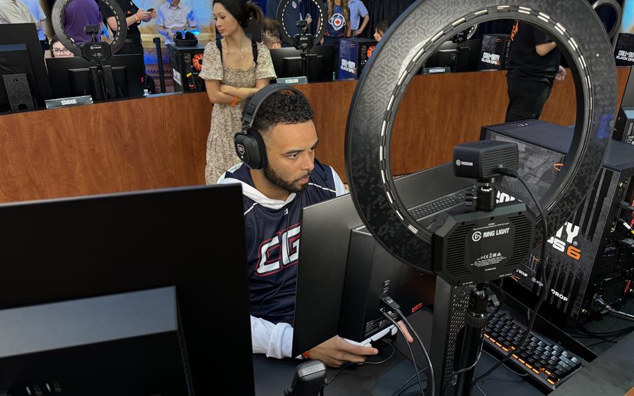 Coast Guard Lt. j.g. Nazere Jones practices playing before the CODE Bowl begins.