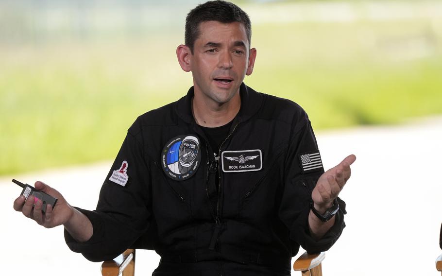 Jared Isaacman speaks at a news conference at Kennedy Space Center.