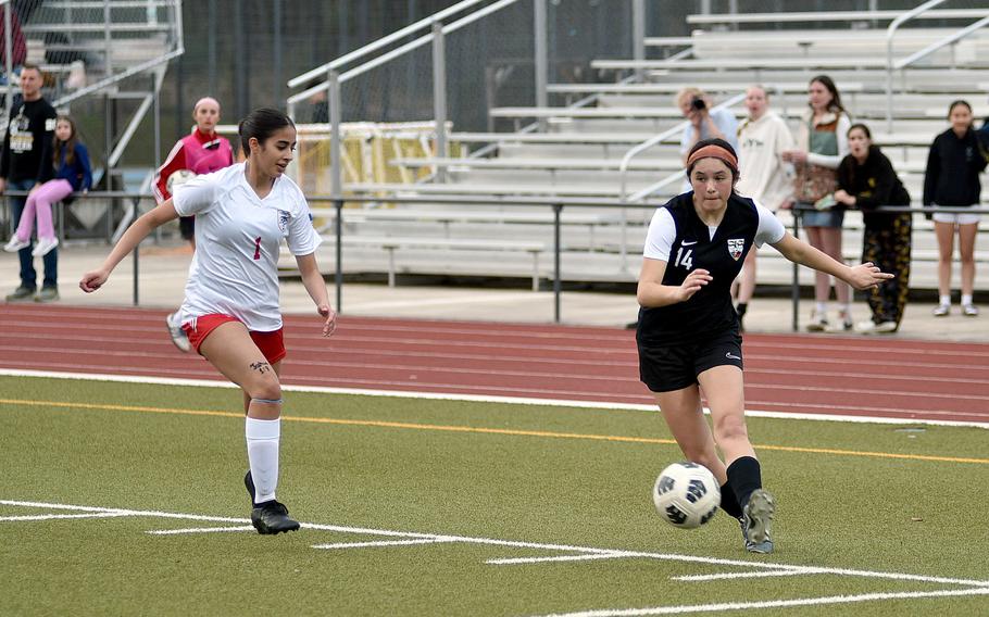 Sienna Ingle crosses the ball to a teammate.