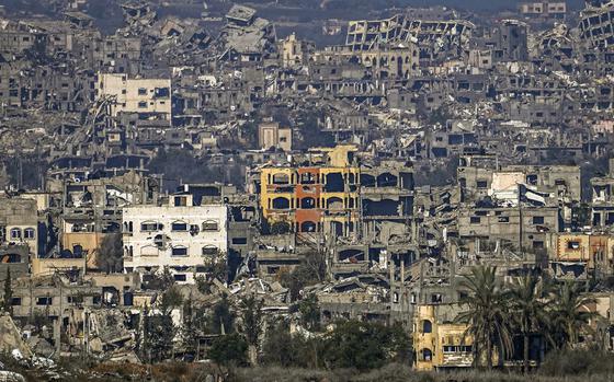 A destroyed part of Gaza City as seen from southern Israel, Thursday Jan. 2, 2025. (AP Photo/Tsafrir Abayov))