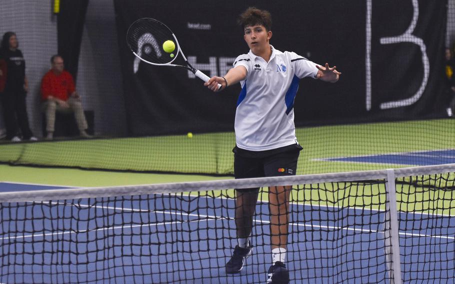 Riccardo Averni hits the ball.