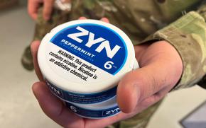 A soldier buys Zyn nicotine pouches at an Army and Air Force Exchange Service store in Kaiserslautern, Germany, on Jan. 10, 2025. A recently released survey of almost 2,000 soldiers at Fort Liberty, N.C., showed a higher use of the pouches among military personnel at the base than among the general public.