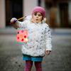 A small girl holds a homemade lantern during a St. Martin procession in Germany. Celebrations in the saint’s honor take place in Germany and elsewhere on or near Nov. 11.