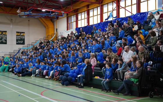 Parents, staff and students sport blue T-shirts that read "Everyday is Blue Ribbon Day at Alconbury Elementary School" during an assembly on Dec. 3, 2024. The school recently earned National Blue Ribbon honors, placing it in select company.
