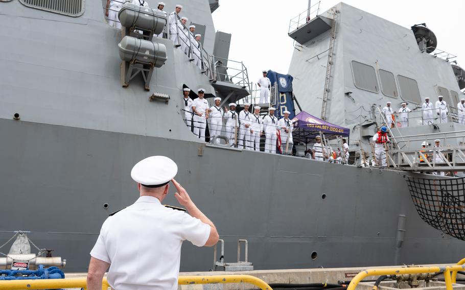 Vice Adm. John Wade, commander of the U.S. 3rd Fleet, salutes sailors aboard the Arleigh Burke-class guided-missile destroyer USS Halsey (DDG 97) during a homecoming ceremony held at Naval Base San Diego, Aug. 16, 2024. 