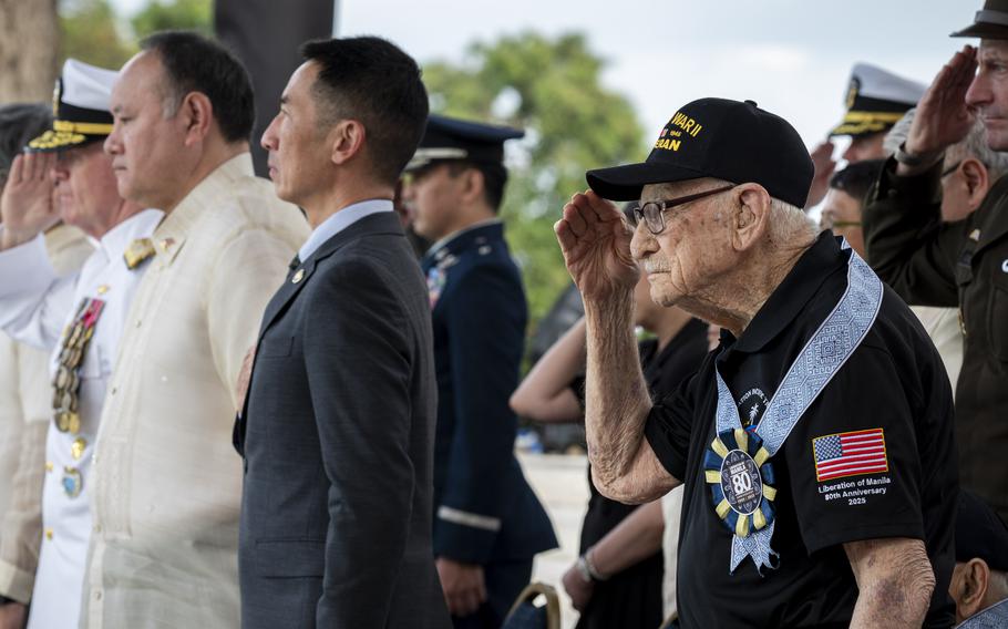 U.S. Army veteran John Hodges salutes.