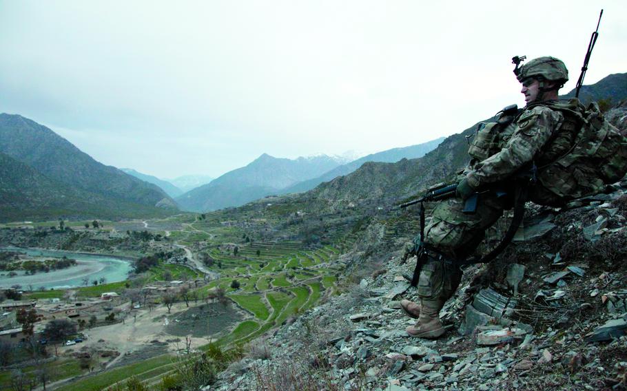 Sgt. Ryan Poulter, a 27-year-old squad leader from Pleasant Hill, Calif., rests 