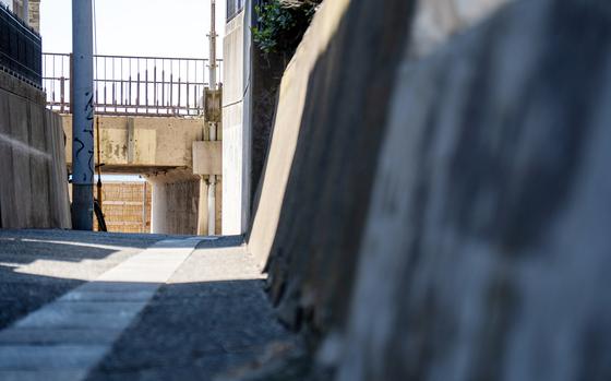 An alley leading to Zushi Beach near Yokosuka Naval Base, Japan, is pictured on July 9, 2022.
