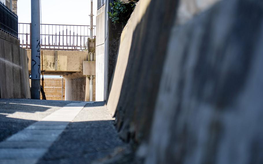 An alley leading to Zushi Beach near Yokosuka Naval Base, Japan, is pictured on July 9, 2022.