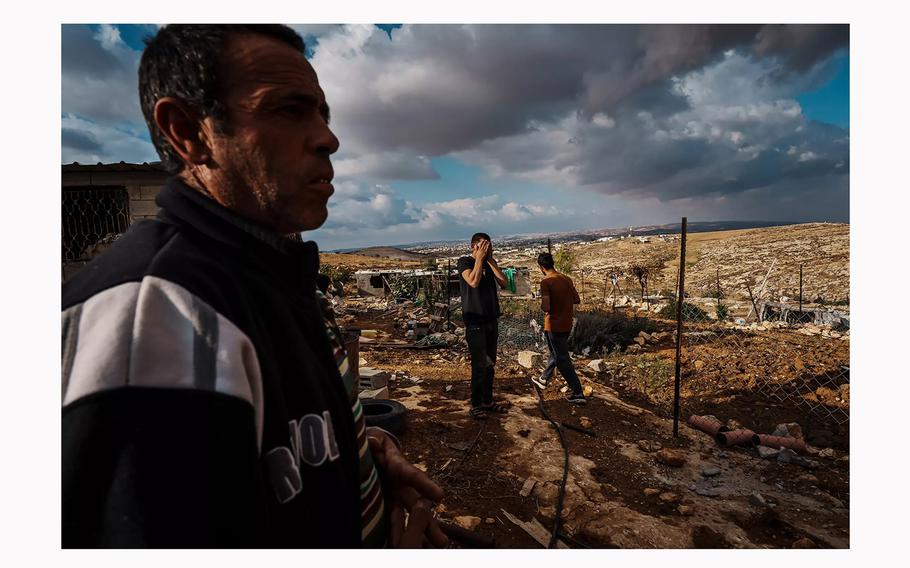 Mohammad Abed inspects the damage to his home and farmland in Shaeb Al-Botum in the occupied West Bank. He said it was attacked by settlers who ransacked rooms and cut water and power lines. 