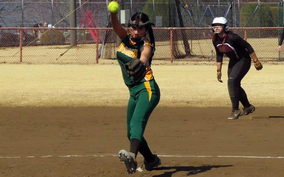 Remi Sherratt winds up to pitch.