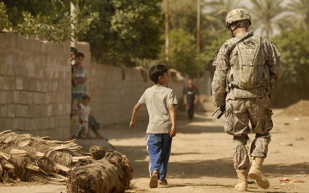 Hed: Keeping company, 2008

Dura'iyah, Iraq, May 21, 2008: A boy accompanies Sgt. James Willits, a soldier from Company A, Task Force 2-6, on a patrol in the streets of Dura’Iyah, Iraq.

Read the story here: https://www.stripes.com/news/2008-05-26/grants-no-predictor-of-business-success-1938239.html1

META TAGS: Wars on Terror; U.S. Army; Operation Iraqi Freedom;