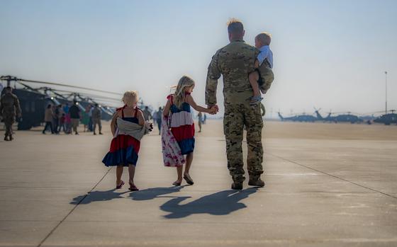 Family, friends and coworkers gathered on Gowen Field on Aug. 22, 2024, to say farewell to Soldiers from the Idaho Army National Guard’s 1st of the 183rd Assault Helicopter Battalion as they left Idaho to prepare to deploy overseas in support of Operation Joint Guardian. Several UH-60M Black Hawk helicopters and more than 100 personnel deployed to Texas to receive approximately 30 days of additional training before departing to Kosovo for an 11-month rotation in support of the NATO peace-keeping mission. The unit has anticipated this mission since October of 2022 and the battalion’s Task Force Sawtooth has trained for the past 18 months in preparation for this mobilization. (U.S. National Guard photo by Master Sgt. Becky Vanshur)