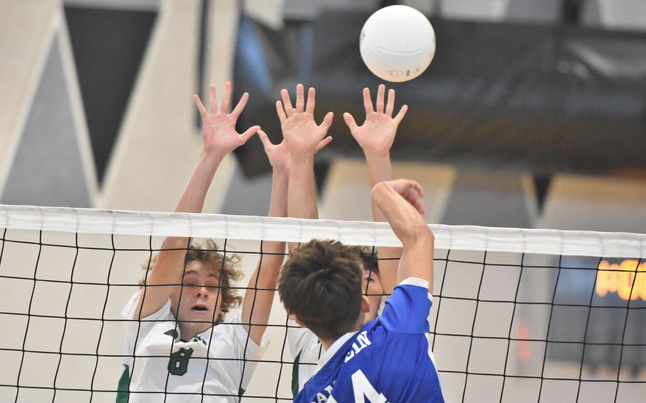 Allesandro Vavra tries to block.