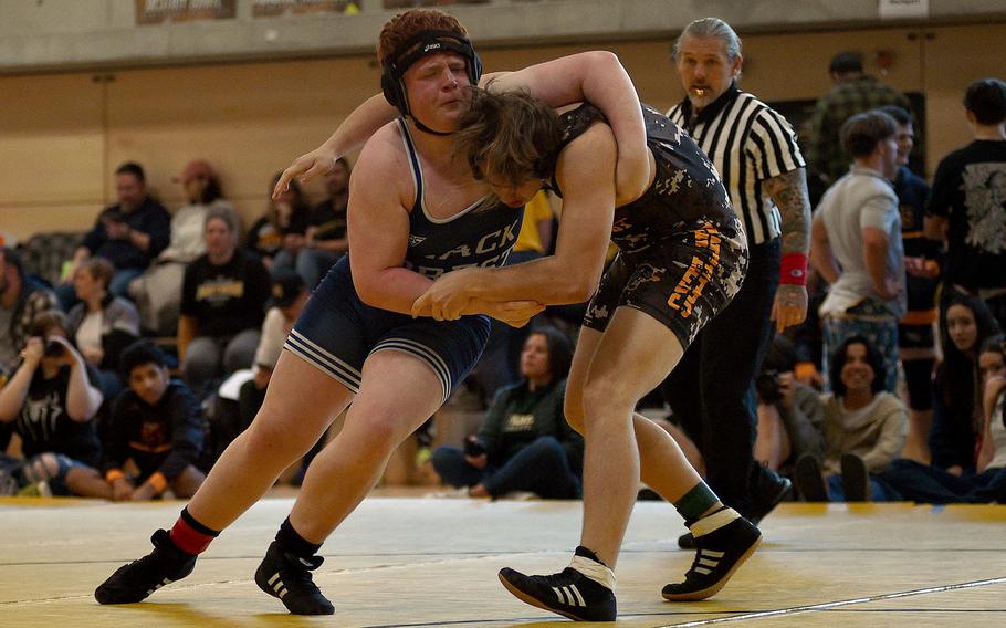 Rogan Ivey tries to take his foe to the mat.