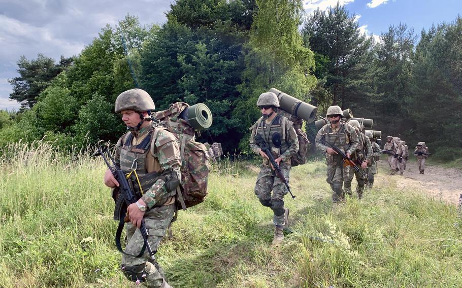 Romanian forces from the 307th Naval Infantry Regiment participate in a simulated multinational amphibious assault on a Polish air force base at Ustka, Poland, as part of Baltic Operations 24. About 35 Romanian troops integrated with Spanish forces during the event on June 16, 2024. 