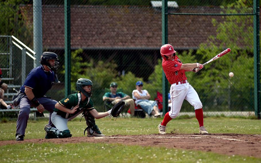 Kaiserslautern junior Logan Bell connects on a double during the fifth inning of the first game of a doubleheader against SHAPE on May 11, 2024, at Pulaski Park in Kaiserslautern, Germany.