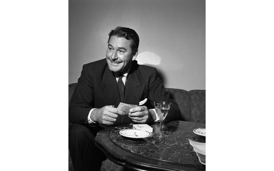 Frankfurt, Germany, Feb. 4, 1954: Errol Flyn Smiles And Relaxes With A ...