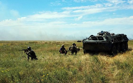 Mykolaiv region, Ukraine, Jul. 14, 2018: U.S. and Ukrainian Marines provide security near a Ukrainian BTR-80 armored transporter during a company-level attack at the land portion of Exercise Sea Breeze. U.S. Marines and Ukrainian troops carried out a combined assault using armored vehicles, U.S. and Ukrainian mortar sections and dismounted infantry, culminating days of drills and classes.
Exercise Sea Breeze launched July 9, 2018 and brought together 19 nations.

Check out additional photos and read the article on Exercise Sea Breeze here.
https://www.stripes.com/migration/ukrainian-troops-keep-russia-on-their-minds-as-they-train-with-us-marines-1.537838

META TAGS: U.S.- Ukraine relations; Russia; Ukraine war; Weapons Platoon, Echo Company, 2nd Battalion, 25th Regiment; 
