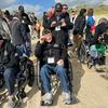 Martin “Marty” Sylvester, center, and his son, Paul, visit Utah Beach with a group of veterans on Wednesday, June 5, 2024. Sylvester landed at Utah Beach on June 7, 1944, the day after D-Day. 

