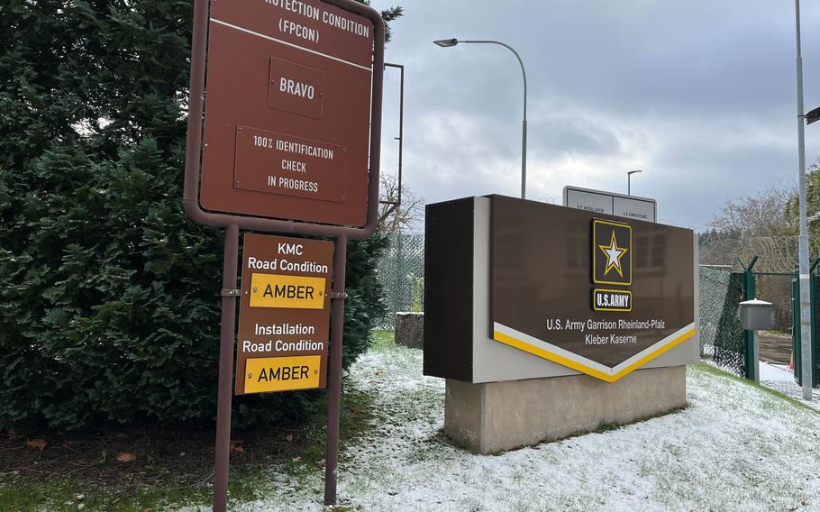 A sign outside one of the entrances to Kleber Kaserne Army base in Kaiserslautern, Germany, displays the road conditions as amber both on the installation and in the the KMC.