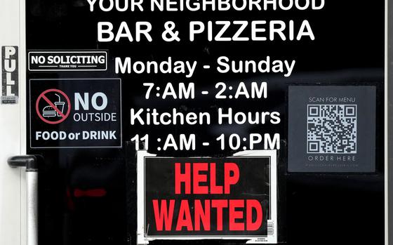 FILE - A help wanted sign is displayed at a restaurant in Chicago, Ill., Nov. 25, 2024. (AP Photo/Nam Y. Huh, File)