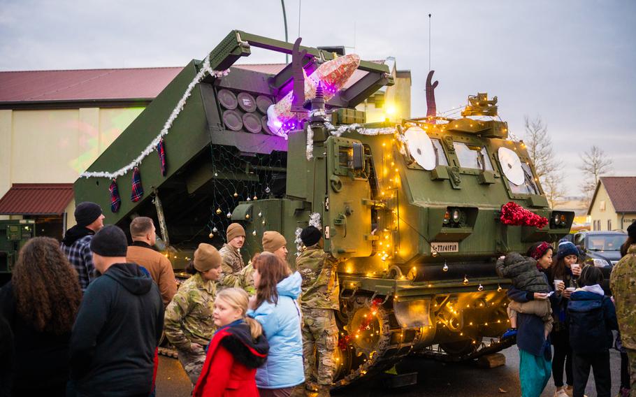 U.S. Soldiers assigned to 1st Battalion, 77th Armor Regiment, 41st Field Artillery Brigade display an M270A2 Multiple Launch Rocket System