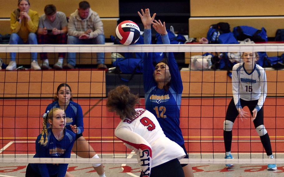 Wiesbaden's Nicole Suh blocks a spike by Kaiserslautern's Rozlynn Onnwn during a match on Sept. 21, 2024, at Kaiserslautern High School in Kaiserslautern, Germany.