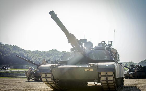 U.S. Army M1A2 Abrams tanks operated by the 1st Armored Brigade Combat Team, part of the 1st Armored Division from Fort Bliss, Texas, stand by for a drill at the Rodriguez Live Fire Complex in Pocheon, South Korea, Aug. 14, 2024.