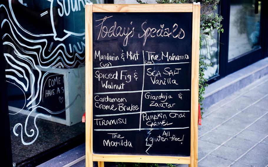 A sign shows what flavor of ice cream is offered at an ice cream shop in Bahrain.