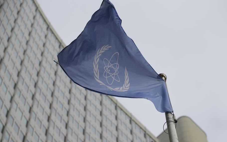 The flag of the International Atomic Energy Agency flies in front of its headquarters during an IAEA Board of Governors meeting in Vienna, Austria, on Feb. 6, 2023. 