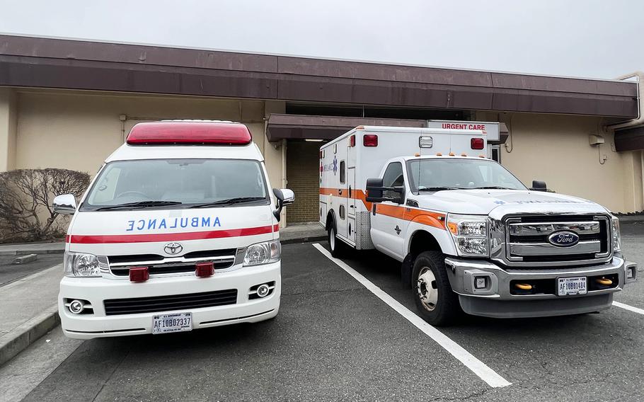 Japanese and American ambulances park outside the 374th Medical Group's urgent care entrance at Yokota Air Base, Japan, March 17, 2023.