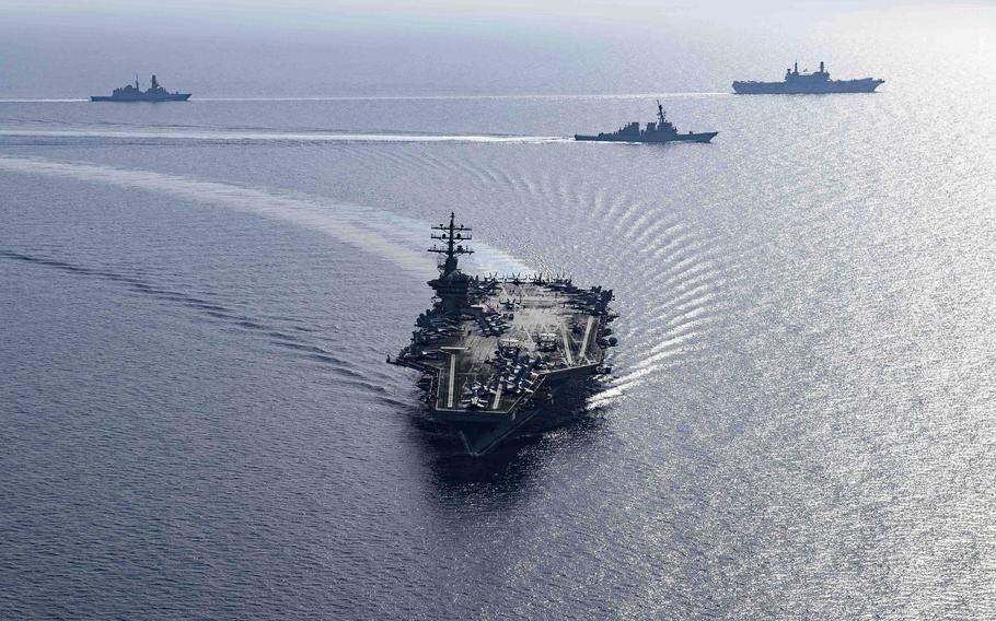 The aircraft carrier USS Dwight D. Eisenhower and destroyers USS Laboon and USS Gravely steam in formation with the Italian aircraft carrier ITS Cavour in the Red Sea on June 7, 2024.