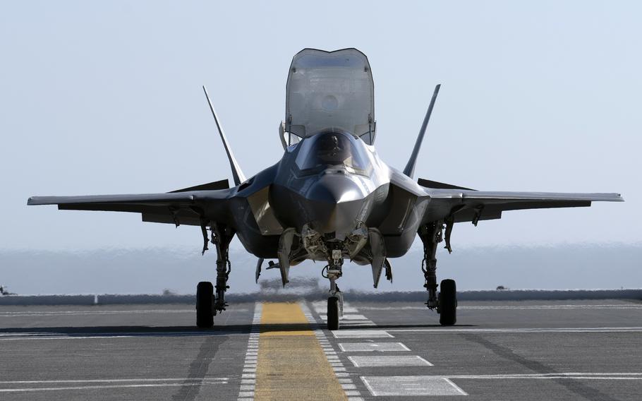 A F-35B Lightning II lands aboard the JS Kaga.