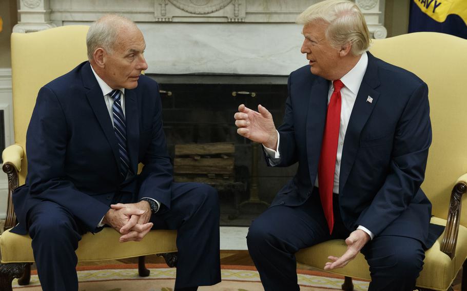 President Donald Trump talks with White House Chief of Staff John Kelly in Washington, July 31, 2017. 