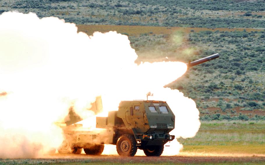 A rocket fires from a High Mobility Artillery Rocket System at Yakima Training Center, Wash. 