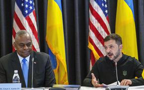 FILE - U.S. Defense Secretary Lloyd Austin, left, listens to Ukraine's President Volodymyr Zelenskyy during a meeting at Ramstein Air Base in Ramstein-Miesenbach, Germany, Friday, Sept. 6, 2024. (Andreas Arnold/dpa via AP, File)