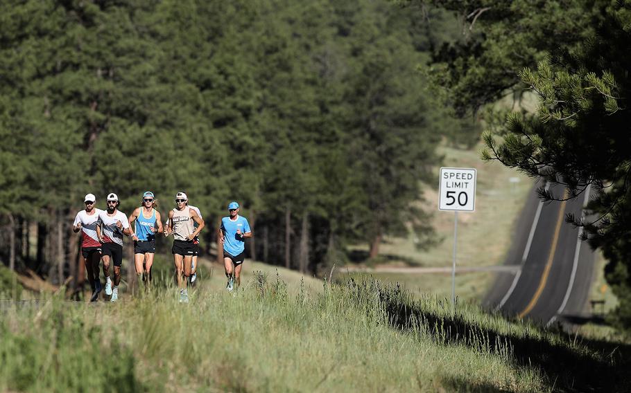 Matt Baxter, left, of New Zealand, running with HOKA NAZ Elite, runs with teammates Rory Linkletter, Nick Hauger, Scott Fauble, Scott Smith and Sid Vaughn during a training session on June 17, 2020, in Flagstaff, Arizona. 