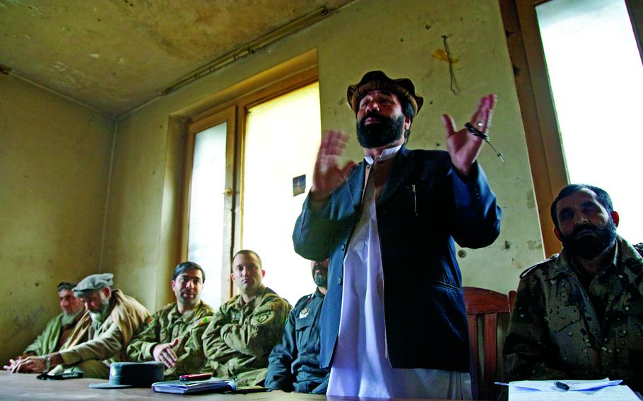 Haji Hamish Gulab, the district sub governor of Kunar province’s Dangam district, speaks during a meeting