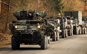 U.S. soldiers assigned to the 2nd Cavalry Regiment conduct a convoy during an exercise at the Joint Multinational Readiness Center in Hohenfels, Germany, in January 2023. President Donald Trump aims to redeploy 20,000 American troops from Europe, Italy's leading news agency said Jan. 23, 2025. It’s unclear what units would be targeted for cuts.