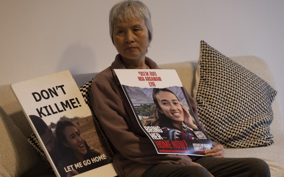 Lior Argamani, mother of hostage Noa Argamani, with posters of her daughter at her apartment in Tel Aviv on Tuesday.