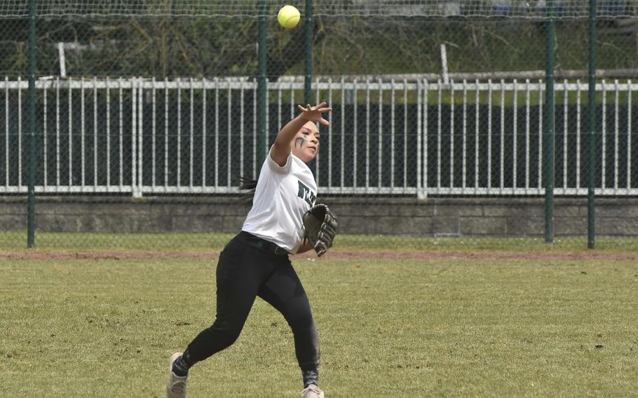 Naples senior Ann-Marie Morales throws the ball from the outfield during day two of the DODEA-Europe softball championshps on May 23, 2024, in Kaiserslautern, Germany.