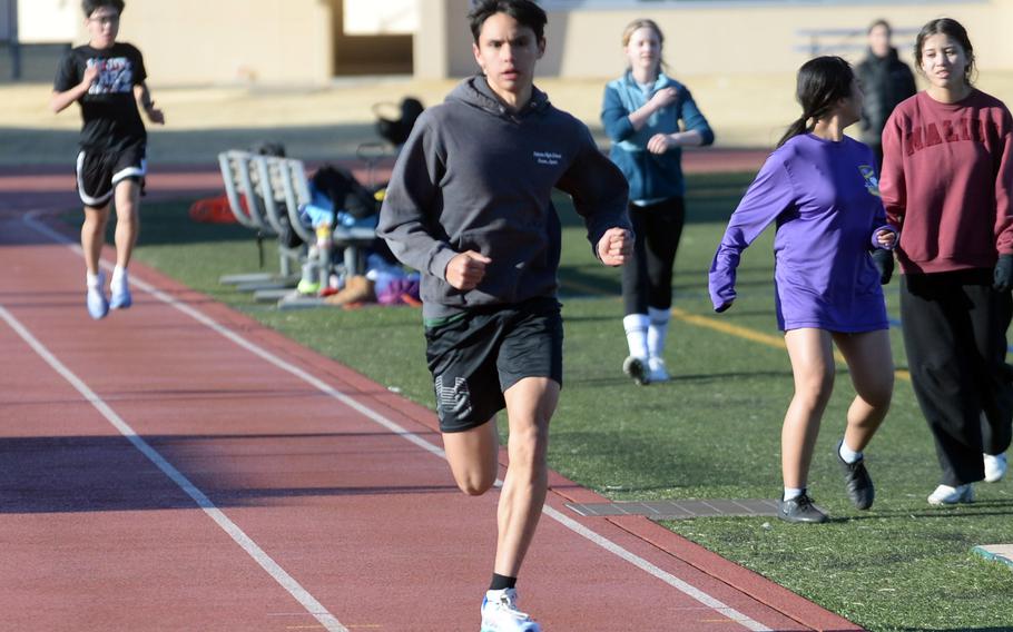 Matthew Rowland practices on the track.