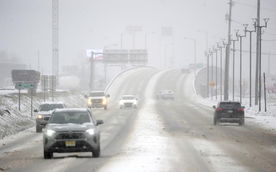 Cars driving on roads covered with snow