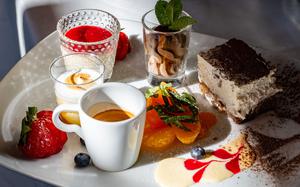 The Cafe Gourmand at Restaurant 11A in Kaiserslautern, Germany, has a selection of small desserts, including some with chocolate and passion fruit. 