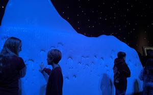 As the tour through the Titanic exhibition in Ludwigsburg, Germany, ends, the focus turns to the sinking of the ship. A block of iceberg gives visitors a sense of the frigid conditions people faced during the disaster in the Atlantic Ocean in 1912. 