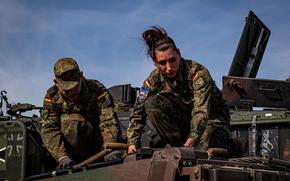 German soldiers prepare their Leopard 2 A7V battle tanks to take part in a NATO exercise in Italy in 2023. A report released March 11, 2025, by the German parliament’s commissioner on the armed forces, said the country’s military is facing a manpower crisis, despite a recruiting effort aimed at building a force to deal with growing security threats.