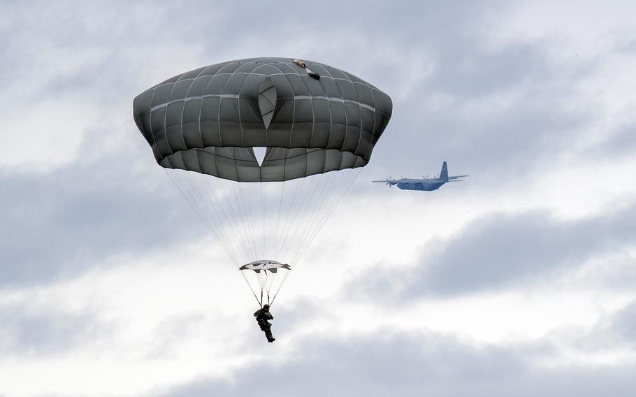 A soldier on a parachute.