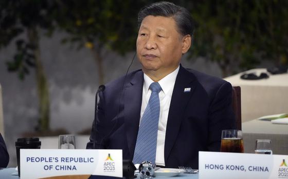 China's President Xi Jinping sits next to other world leaders during the Asia-Pacific Economic Cooperation (APEC) conference Thursday, Nov. 16, 2023, in San Francisco. (AP Photo/Jeff Chiu)